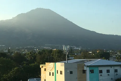 A volcano overlooking a town in El Salvador