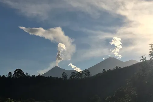 Smoking volcanoes in Guatemala seen from a distance